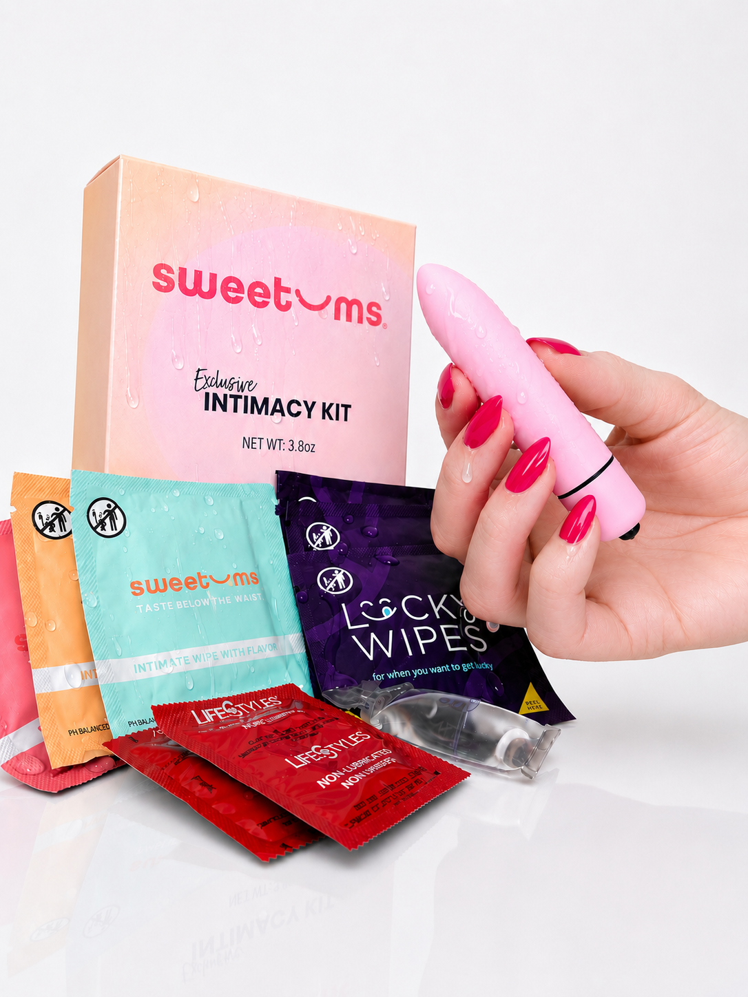 hand holding with the contents of the intimacy kit laid out